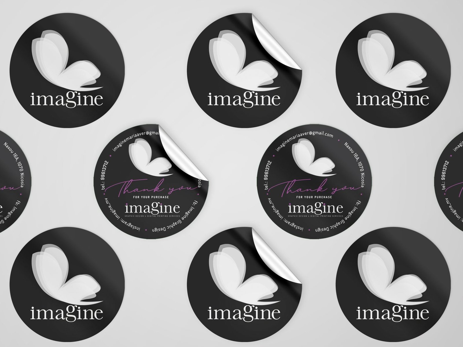 Custom printed circular sticker labels with butterfly logo mark